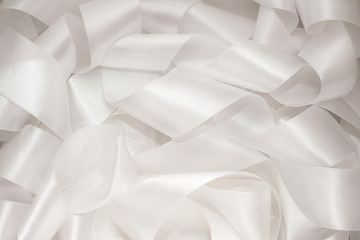 white sewing ribbon like decoration