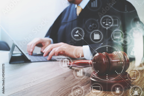 Cuadros en Lienzo justice and law concept.Male judge in a courtroom with the gavel