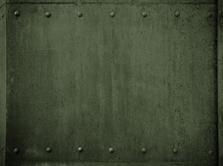 Wall Mural - old military metal green armor background with rivets