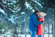 © Dmitriy Shipilov - woman and man having fun in winter forest