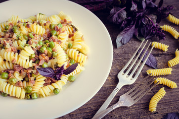 Sticker - Pasta with prosciutto on wooden background