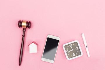 Top view lawyer desk, object on pink background.