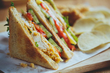 fried chicken sandwich with chip for meal