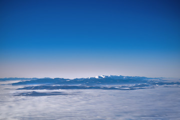  View of clouds covered Tatra mountain peaks