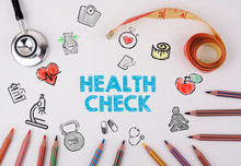 Health Check Concept. On The Table Stethoscope And Colored Pencils