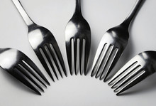 Forks In A Semicircle