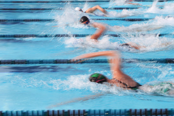 Sticker - Freestyle swimmer. Motion blurred image