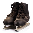 pair of old black dusty ice skates