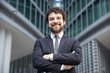© Stocked House Studio - Portrait of a cheerful young businessman