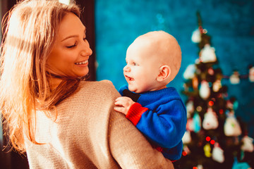 Wall Mural - young and happy mommy with her cute little boy