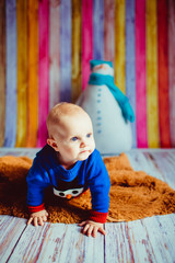 Wall Mural - portrait of a little boy in the room