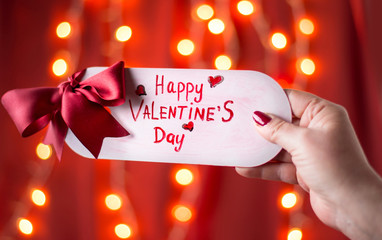 Wall Mural - Hand holding Happy Valentines day card