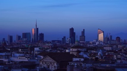 Canvas Print - Milan skyline with modern skyscrapers in Porta Nuova business district in Milan, Italy, night view.