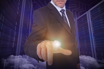 Poster - Composite image of businessman pointing