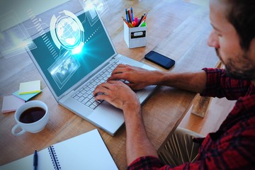 Poster - Composite image of creative businessman typing on laptop 