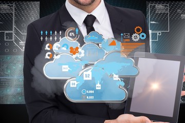 Poster - Composite image of smiling businessman showing his tablet pc 3d