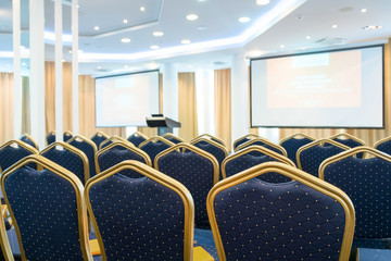 Poster - Chairs in a row in conference room