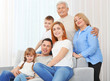 © Africa Studio - Big happy family on couch