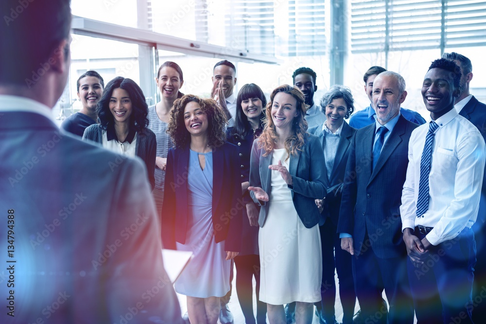 Businessman interacting with colleagues
