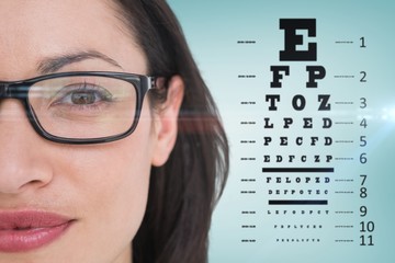 Poster - Composite image of pretty brunette wearing eye glasses