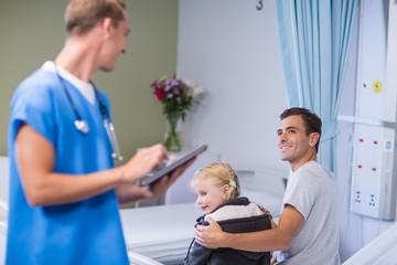 Sticker - Doctor using digital tablet while talking to patient