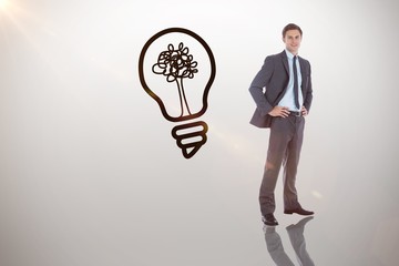 Poster - Composite image of smiling businessman with hands on hips