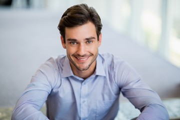 Happy businessman smiling