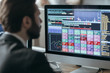 © LUMINA IMAGES - Man broker analyizing chart and stock market performance forecas