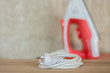 © sek_gt - Electric iron cable plug safety concept