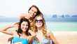 © Syda Productions - happy young women in bikinis on summer beach