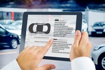 Poster - Composite image of man using tablet pc