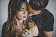 © ADDICTIVE STOCK - Passionate couple holding hands