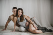 © ADDICTIVE STOCK - A couple embracing on the floor