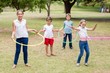 © WavebreakMediaMicro - Kids playing with hula hoop