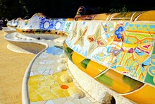 Colorful Curving Mosaic Walls Of Parc Guell, Barcelona, Spain