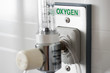 O2 Pressure gauge for measured control of oxygen to a patient in an emergency used in hospital equipment plugged into the wall with clear glass valve