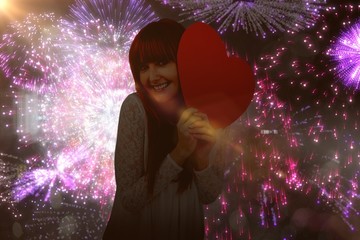 Poster - Composite image of smiling hipster woman with a big red heart
