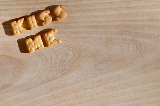 Kiss me. Heap of edible letters