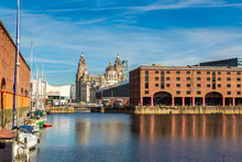 Albert Dock And Three Graces Building In Liverpool