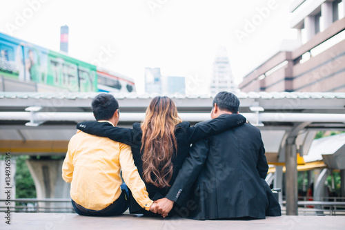 Cuadros en Lienzo Businessman with his wife, and adulter. Gay lover. Bisexual conc