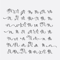 Fototapete - Vector set of calligraphic letters M, handwritten with pointed nib, decorated with flourishes and decorative elements. Isolated on grey black imperfect letters sequence. Various shapes collection.
