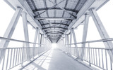 Fototapeta Przestrzenne - Light from the way out of modern metal structure bridge