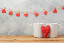 Valentines Day Concept With White Coffee Cups And Heart Shape Over Rustic Background