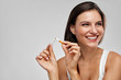Quit Smoking. Beautiful Happy Woman Holding Broken Cigarette