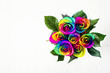 Image of rainbow roses on white  background. Postcard for Valentine's and Mother's day
