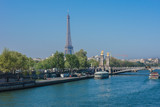 Fototapeta Paryż - Seine River Embankments and Alexandre III bridge. Paris, France.