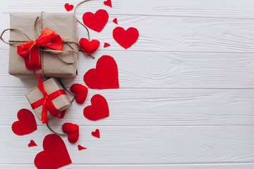 valentine's day. presents, heart felt and decor on wooden background
