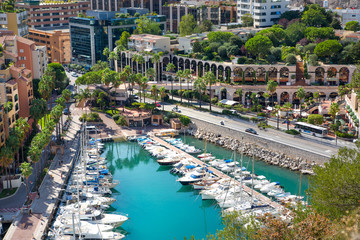 Wall Mural - Monaco, Monte Carlo. View of the marina with luxury yachts and residential development