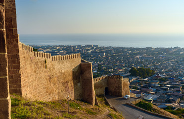 Wall Mural - Wall of Naryn-Kala fortress and view of Derbent city.