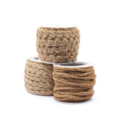 Wall Mural - Pile of rope bobbins isolated